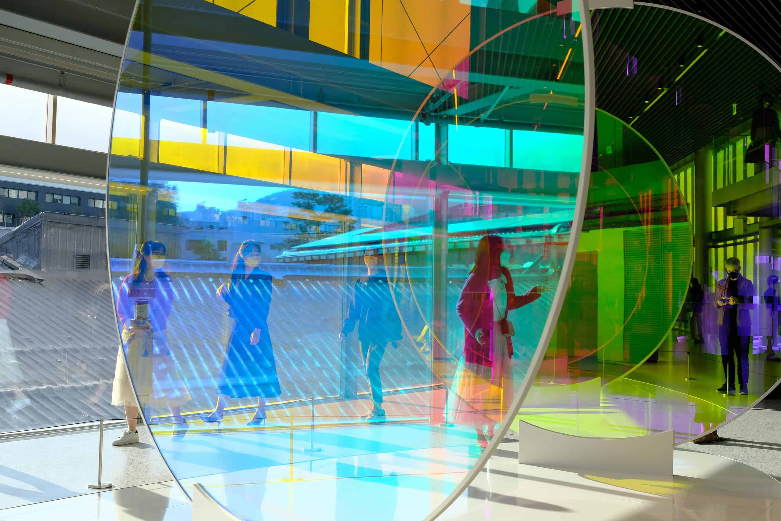 Colorful modern glass installation at NJS Tech, showcasing innovative technology and design.