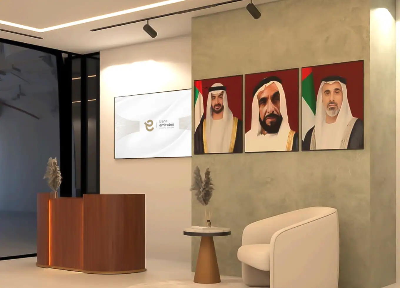Modern corporate reception area with Emirati leaders portraits and digital signage.